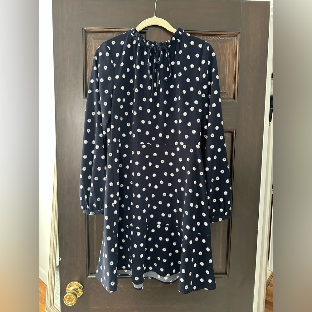 Navy blue long sleeve dress with white floral pattern